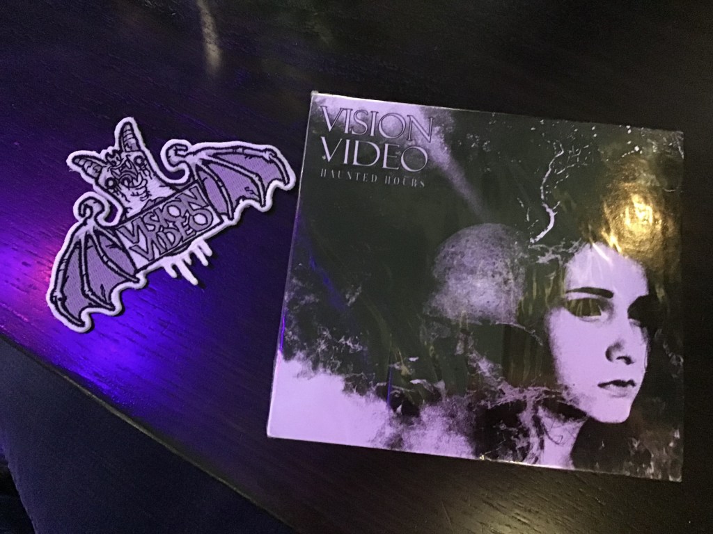 Vision Video Band Patch and Haunted Hours CD