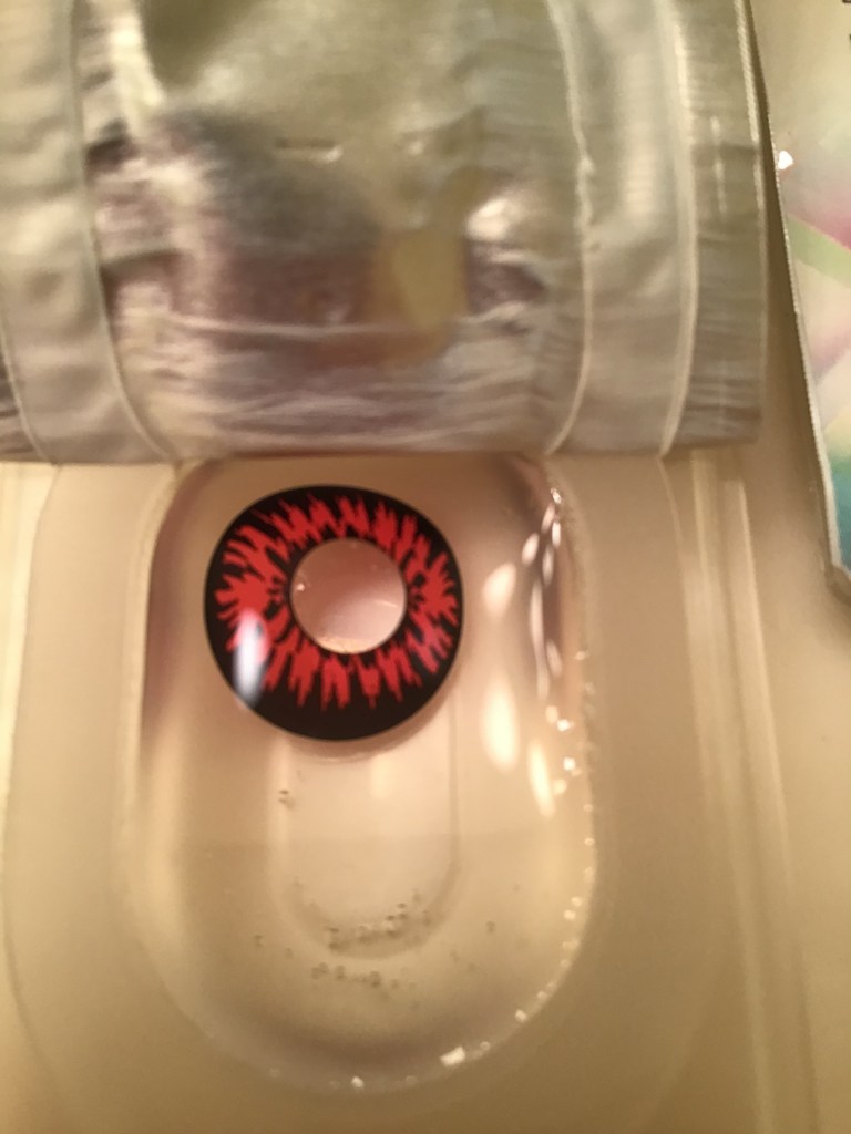 Show Product in opened package FX Colors Blood Thirst Contact opened from package single contact